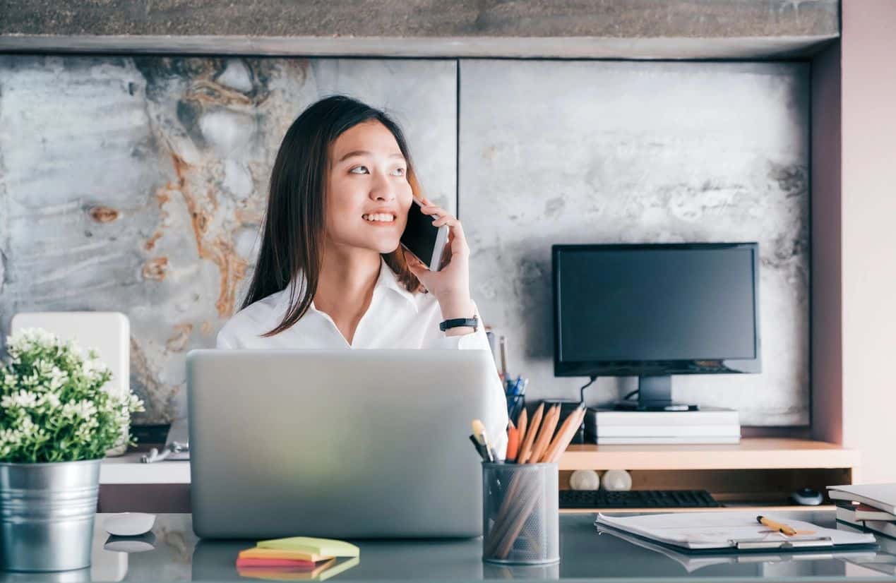 A female creator on the phone talking about her next project