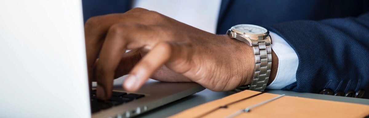 Influencer typing on laptio