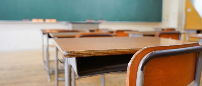 Close up view of a student's desk in a classroom