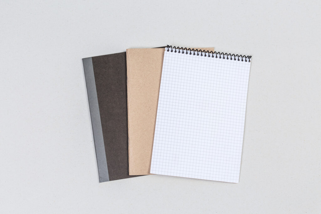 Journal, notebook, and spiral notebook